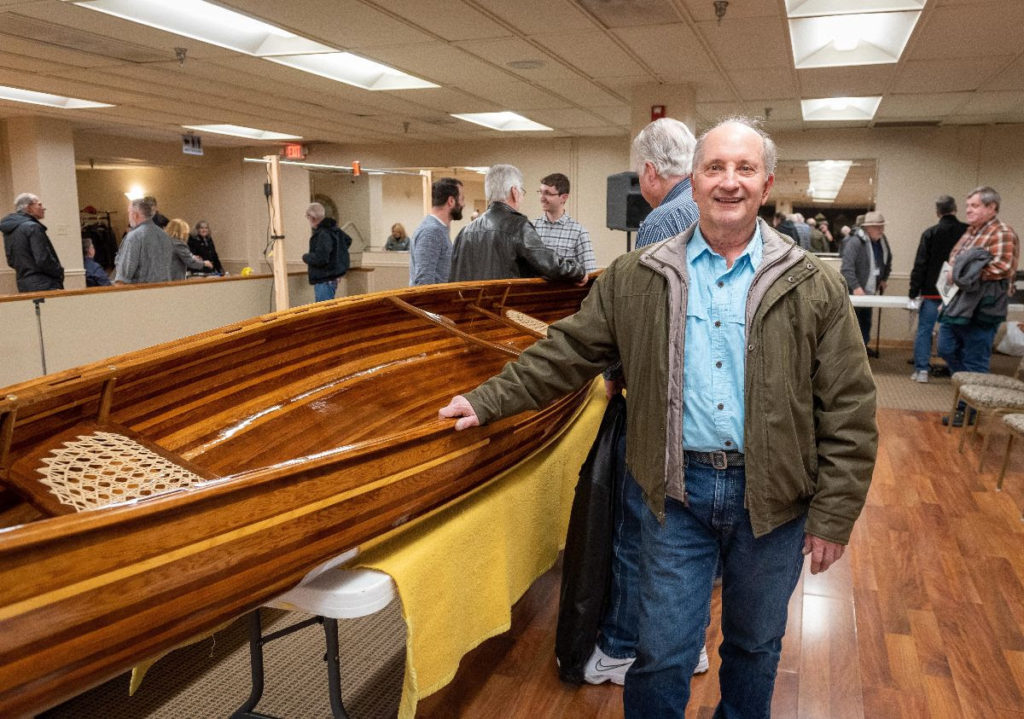 Wayne Meglan with his hand-built canoe